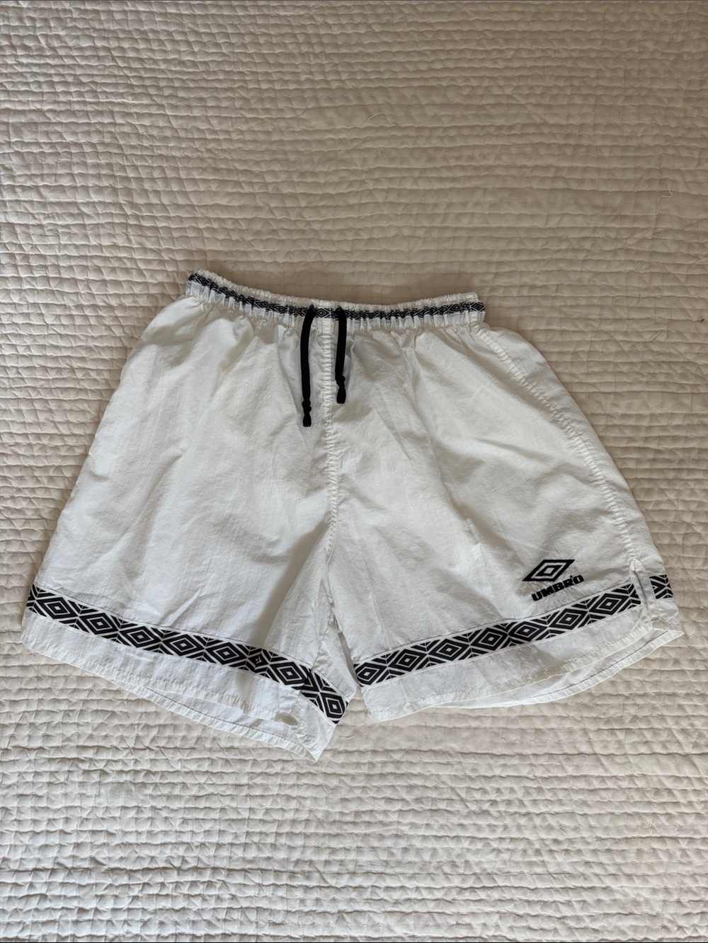 Umbro White Athletic Shorts with Black Geometric Trim